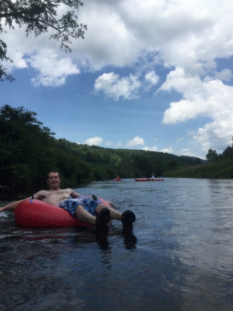 Chris floating down the river