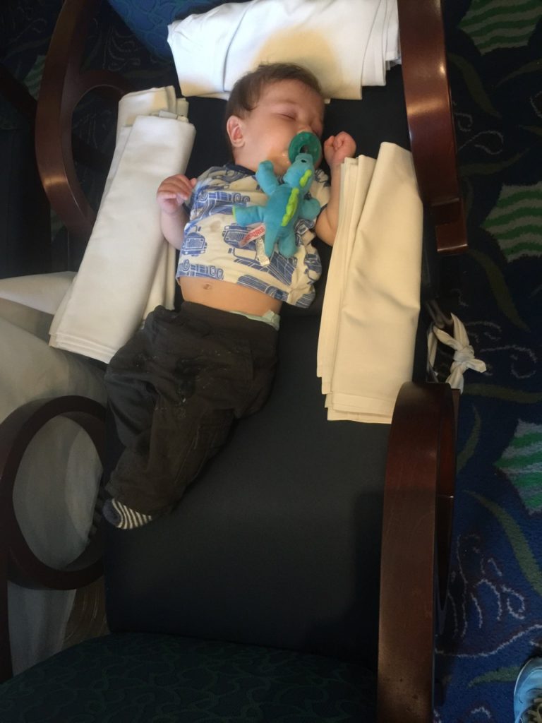 K sleeping in a makeshift bed in the dining room